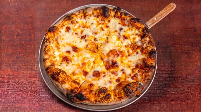 Ali's Six Cheese Pizza.